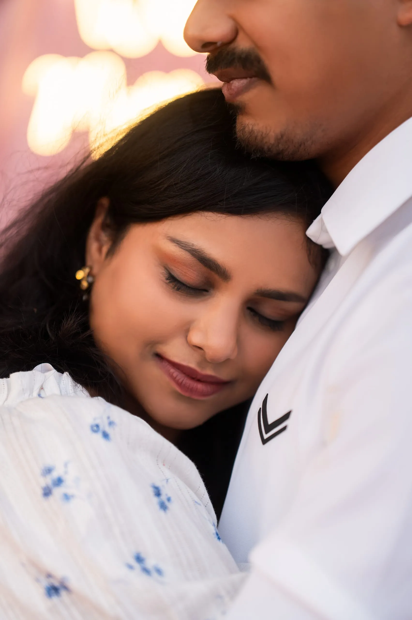 A quiet forehead kiss.