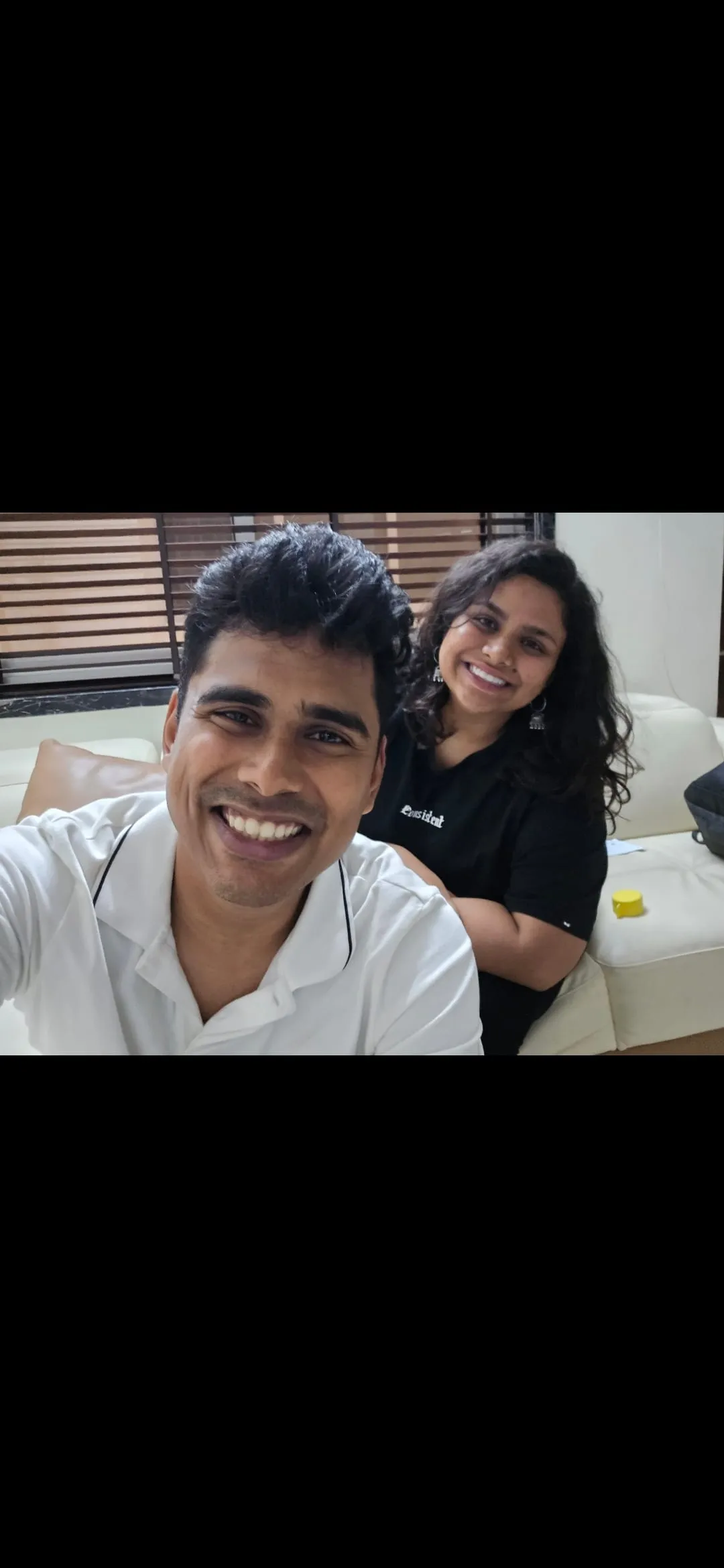 A close, happy selfie of Swathi and Gautham